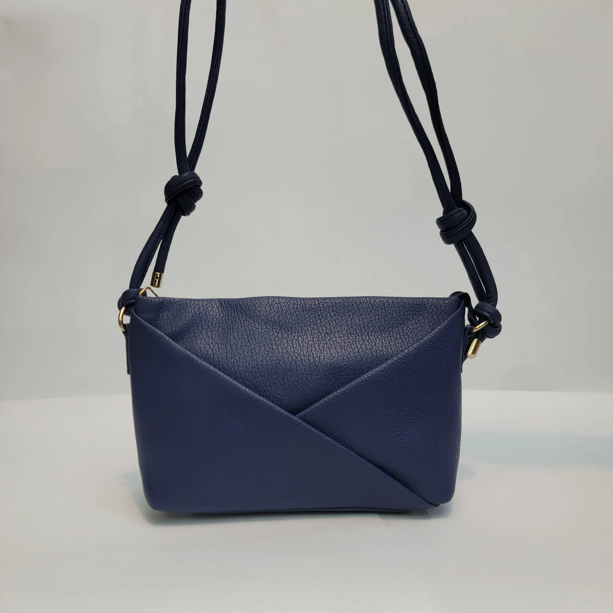 Cross B. navy blue envelope-style crossbody bag, front view