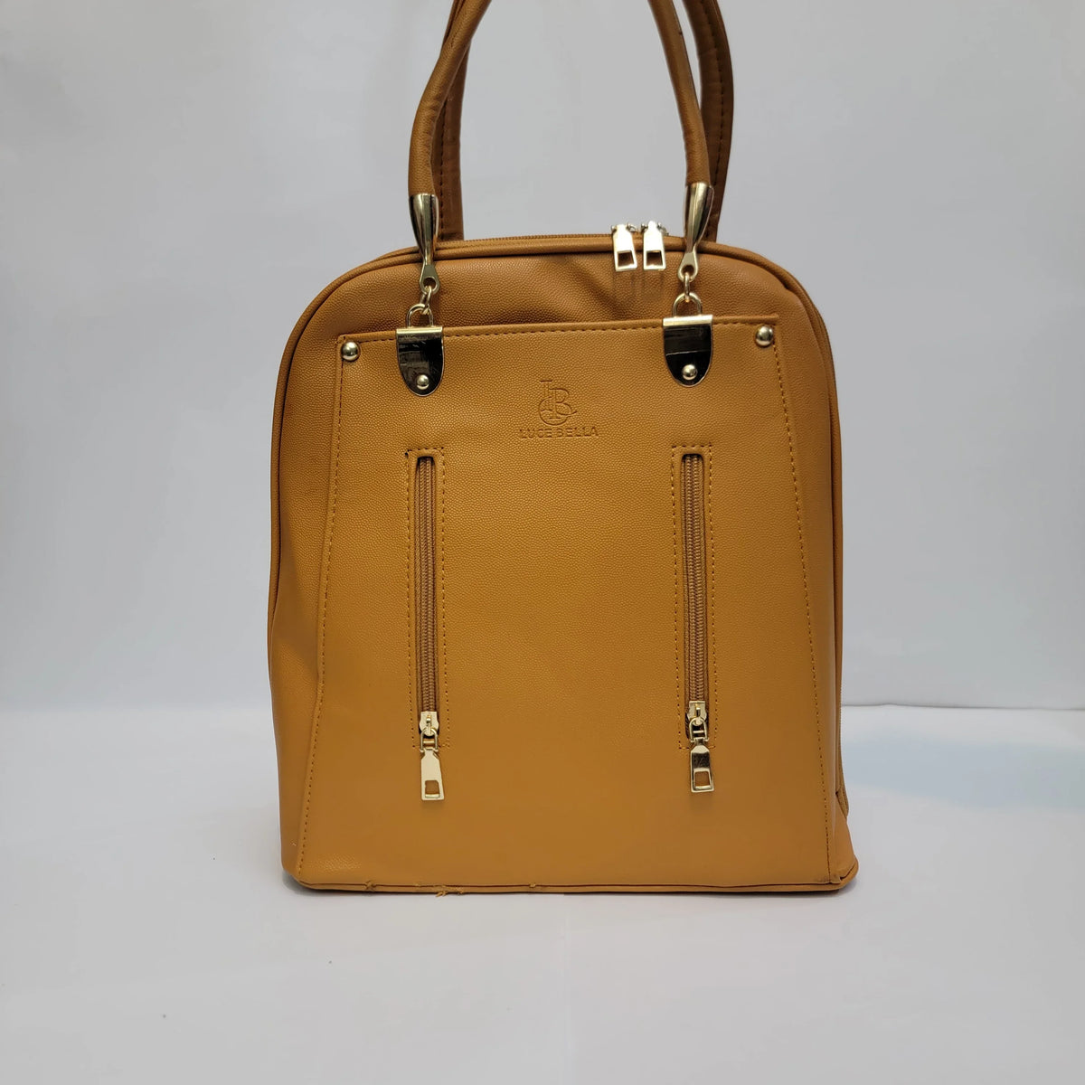 Cross B. tan faux-leather backpack with gold-tone hardware, front view