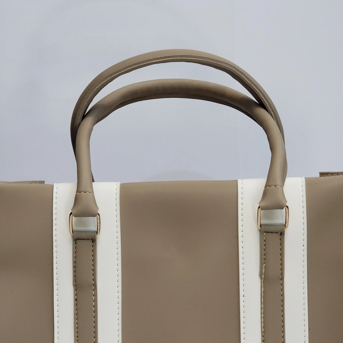 Cross B. beige structured tote bag, side view showing handles