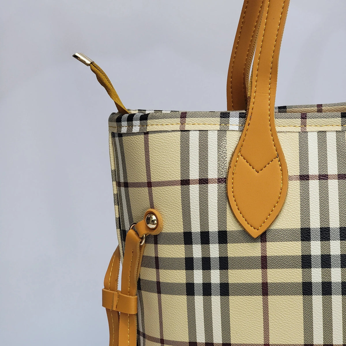 Cross B. mustard checkered tote bag, close-up of print and hardware