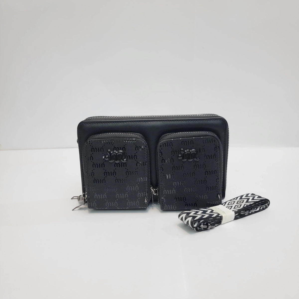 Cross B. black crossbody bag with double front pockets, front view