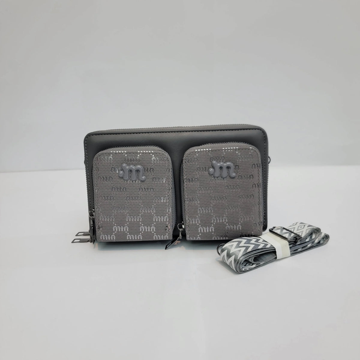 Cross B. gray crossbody bag with double front pockets, front view
