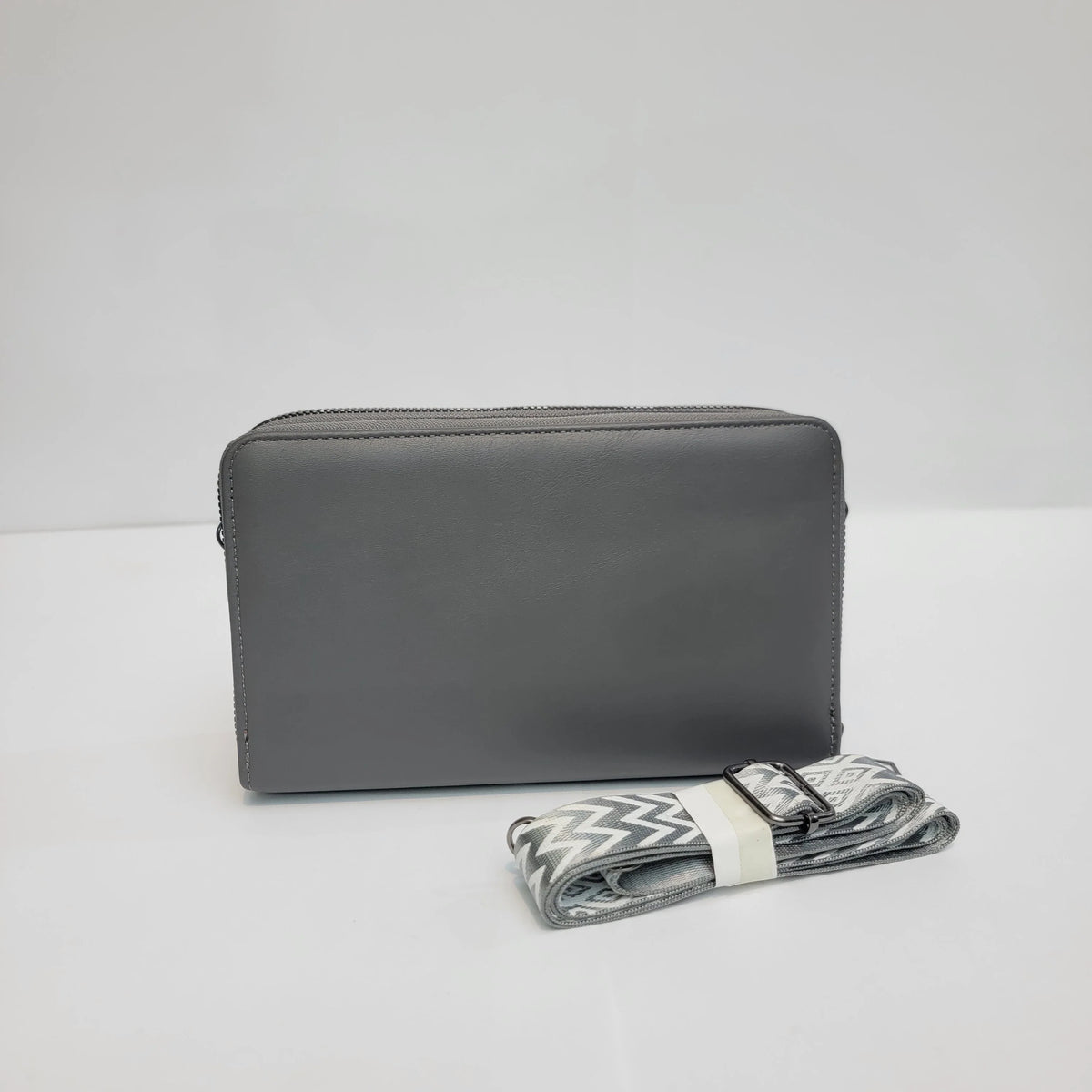 Cross B. gray crossbody bag, side view