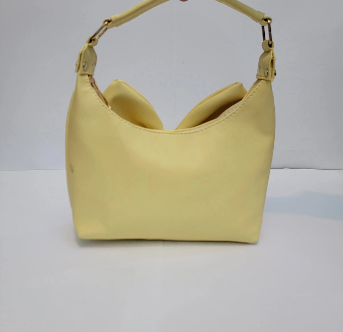 Cross B. bow-detail shoulder bag, side view, fourth colorway