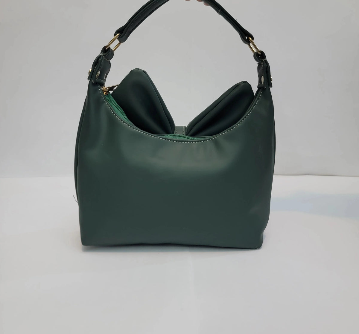Cross B. bow-detail shoulder bag, side view, alternate colorway