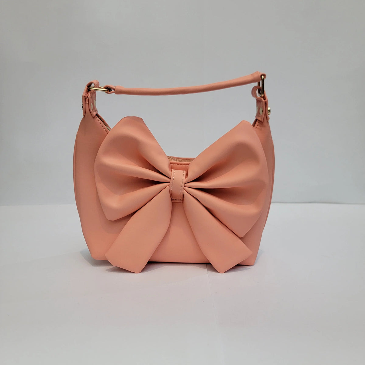 Cross B. bow-detail shoulder bag, front view, second colorway