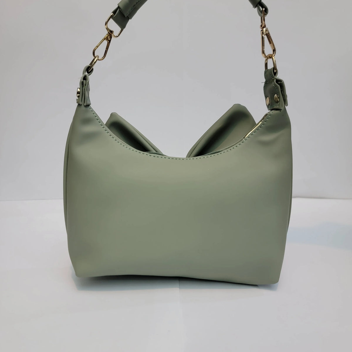 Cross B. bow-detail shoulder bag, side view, third colorway